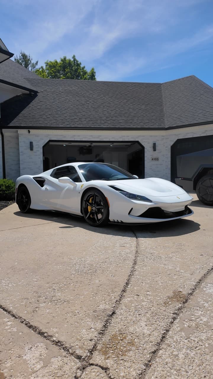White Ferrari on driveway after detailing